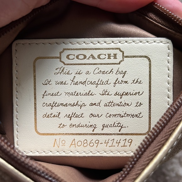 Coach wristlet with gold and flower accent - Picture 6 of 7